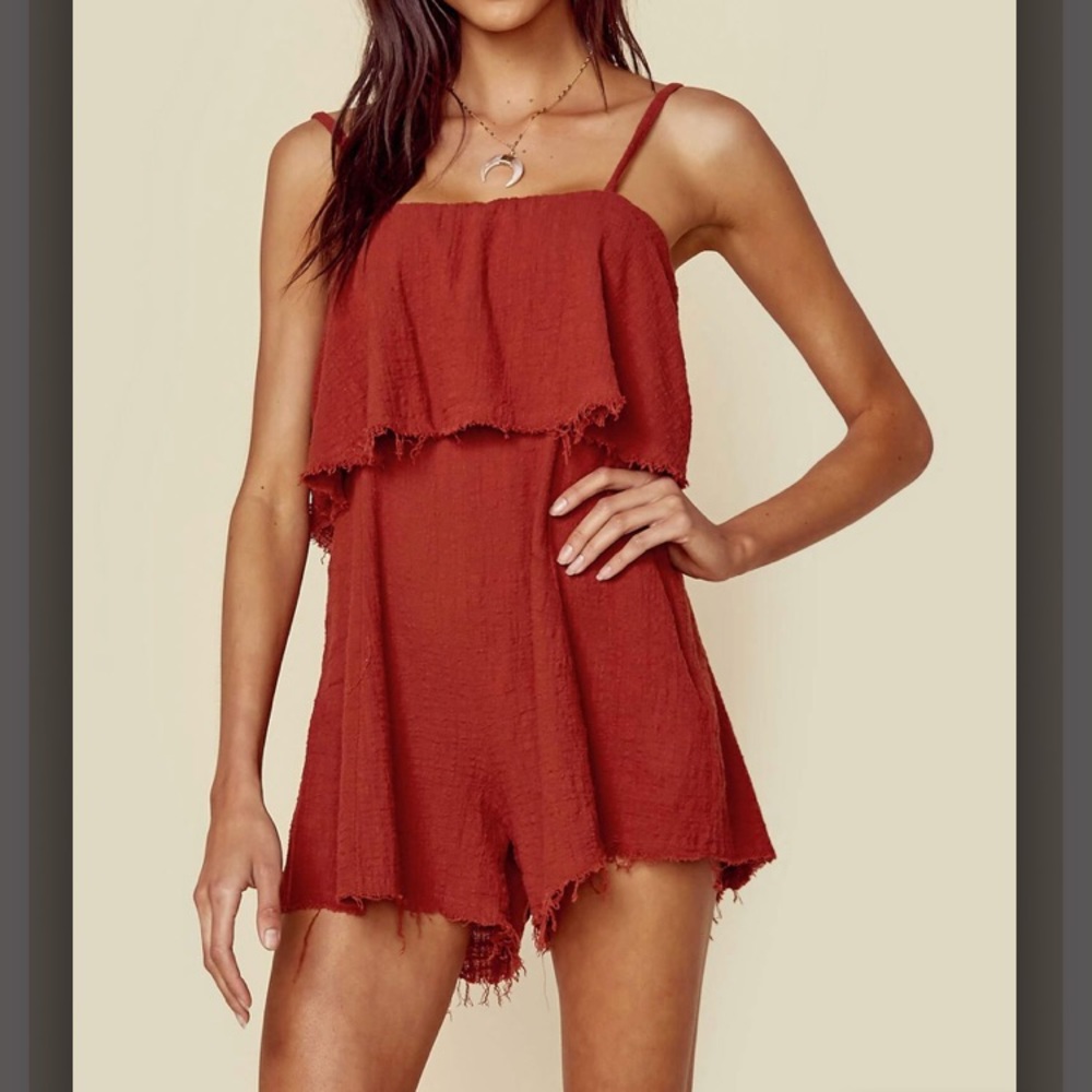 Riding Tides Playsuit. Burnt red color